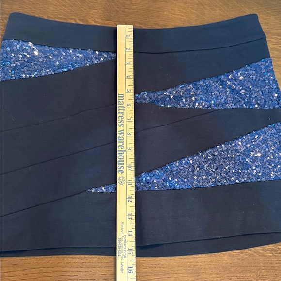 Express NWT black mini skirt with blue sequin panels
Size 12 sparkle metallic - Picture 7 of 10
